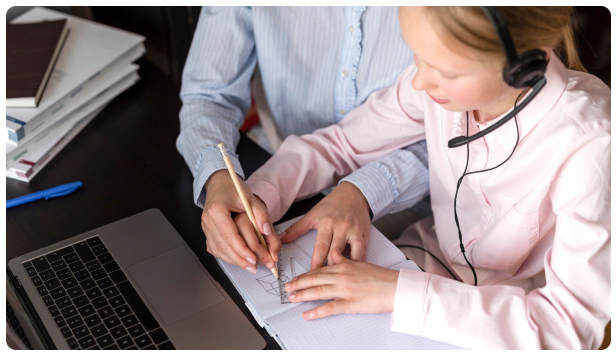 Support agent wearing a headset reviewing documents with a client